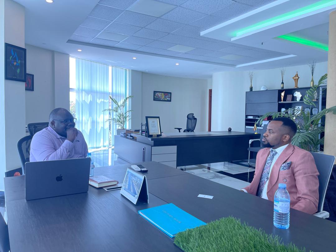 BKI office meeting – Brian Kagyezi consulting with a client